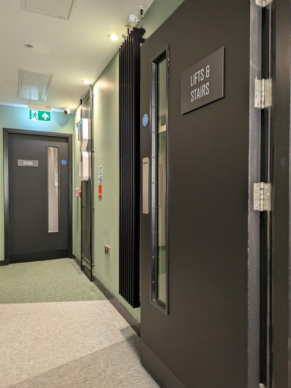 Image of door to lifts at the hotel