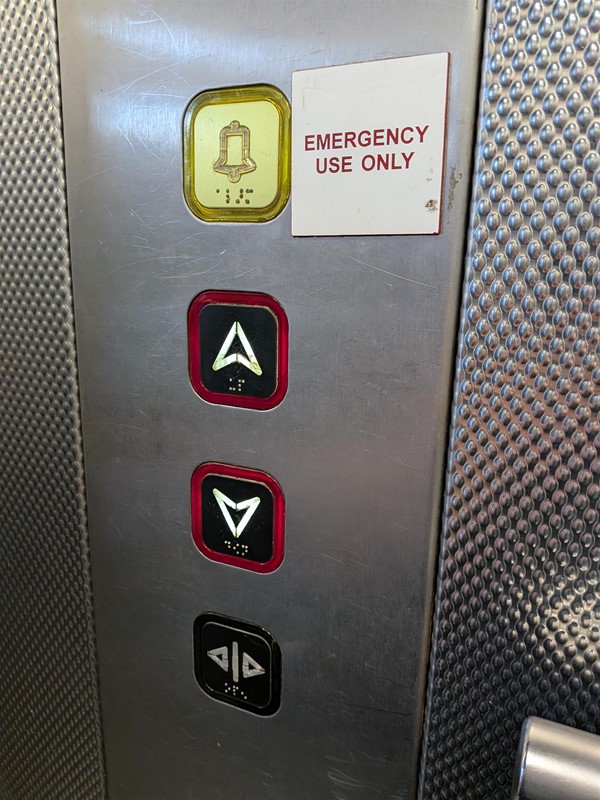 image of buttons inside lift to upper level