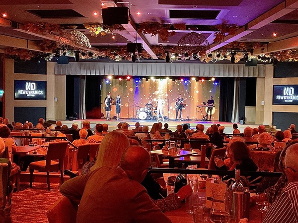 Image of people at tables