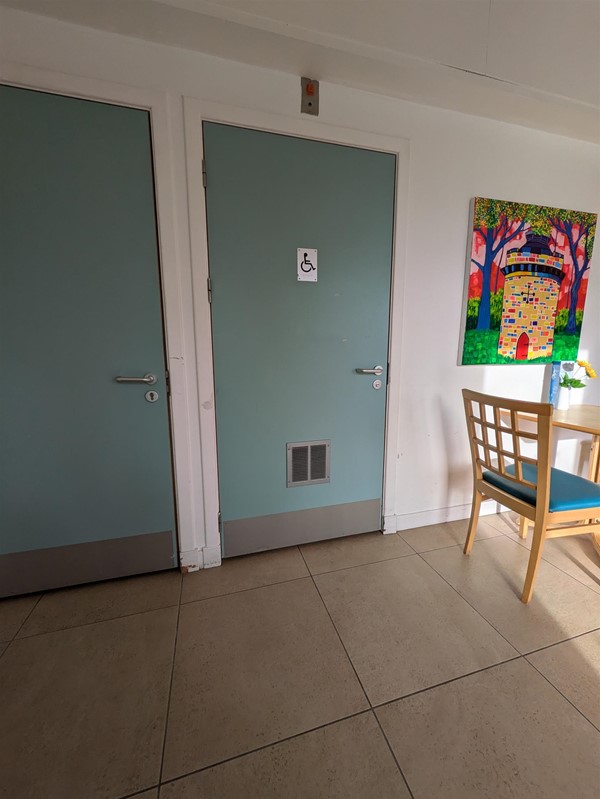 Image of café-side door to  Peacock Rooms Café