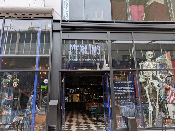Image of entrance to Merlins