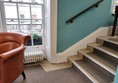 Steps leading up to the inaccessible first floor mezzanine area.