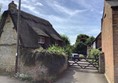 Picture of a wooden gate between two houses