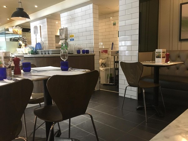 Image of some of the tables on the level access in Pizza Express.