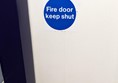 Visible sign, why are STAFF opening this door