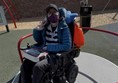 Person on a roundabout