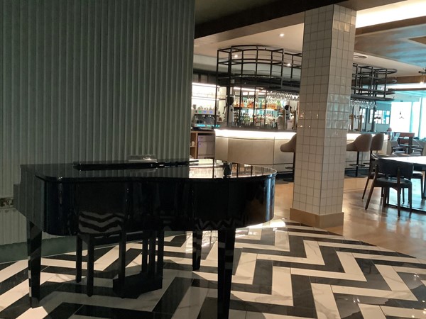 Picture of Hotel piano within the dining area