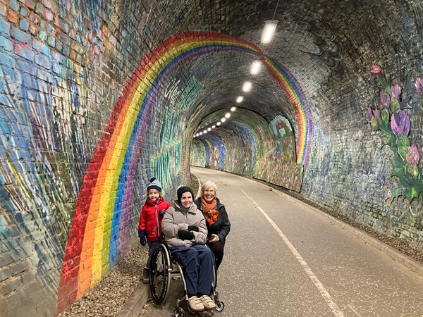 Image of three people in the tunnel