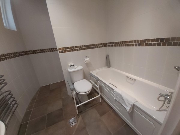 My 1st room - family suite with step free shower, photo of toilet and bath