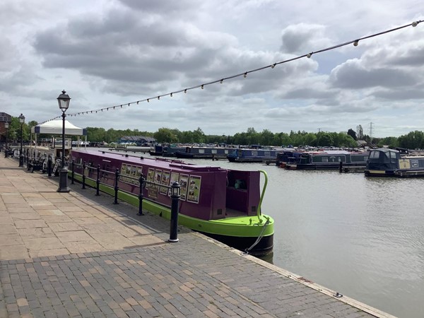 Picture of a narrow boat in a marina