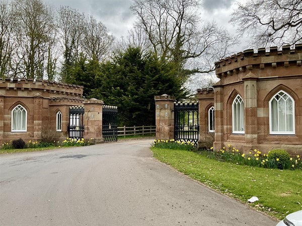Image of a rd brick entrance way
