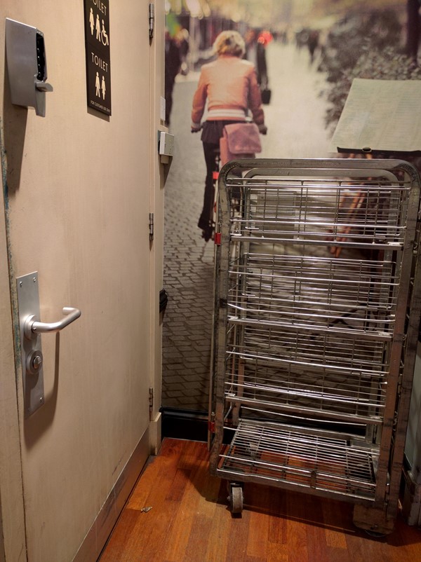 Picture of Caffe Nero - Basket in front of accessible toilet