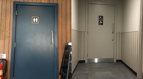 Images of signs leading to accessible toilet.