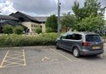 Picture of a car parked in a parking space
