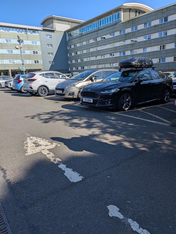 Disabled spaces in car park.