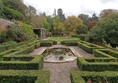 Hedge garden with gravel surface.