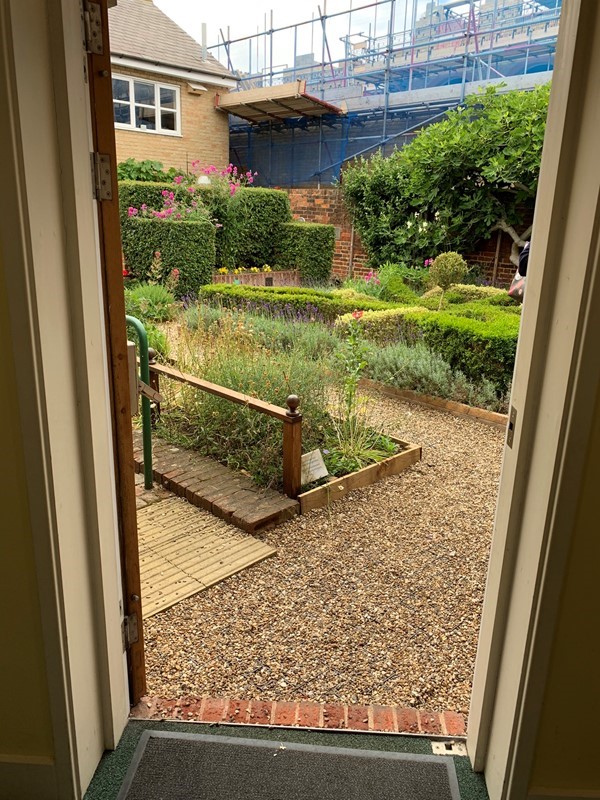 looking out to a garden with ramp
