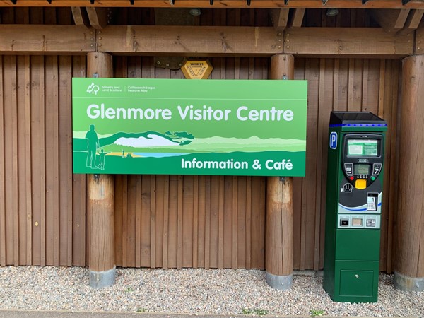 Picture of a sign saying "Glenmore Visitor Centre and  Cafe"