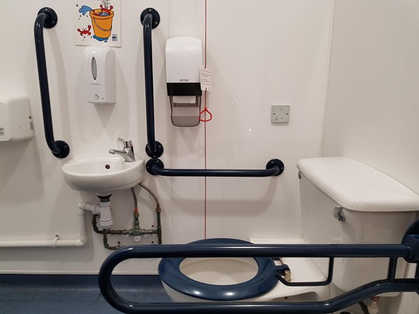 Cromer pier accessible loo with Euan's Guide emergency cord card!
