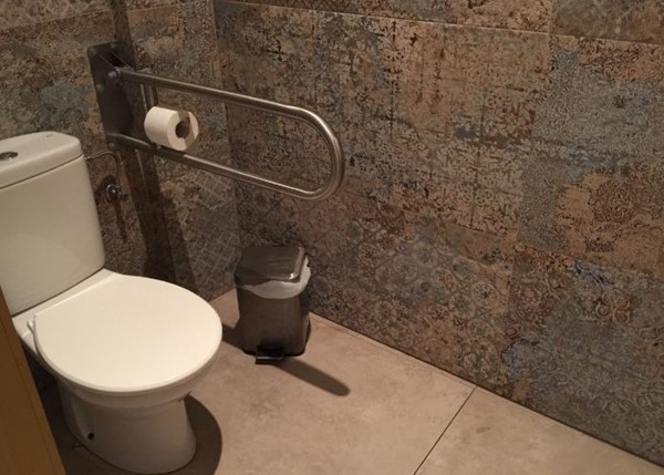 Disabled toilet on the smaller side.