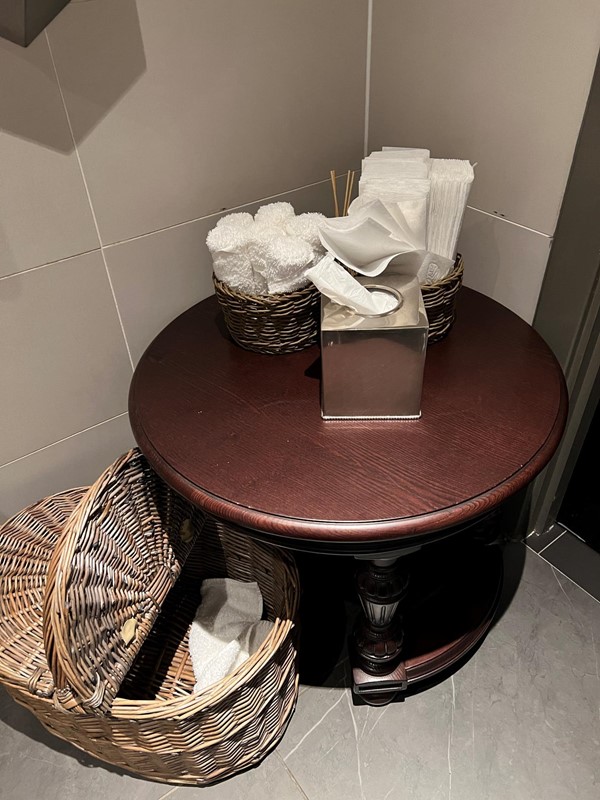 The hotel has tried hard to replicate the extras that are provided in the main toilet. It was lovely to see an accessible toilet have these extras which made me feel valued and important to the hotel. Unfortunately, the table and basket take up valuable wheelchair-turning space and larger NHS size wheelchairs, power chairs and scooters will not be able to turn around and will have to reverse out of the toilet.