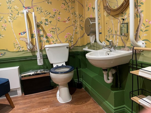 Image of a bathroom with a sink and toilet