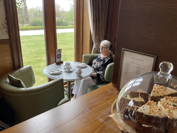 Image of a person seated at a table