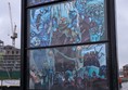 Image of a glass window by the Riverside showing Hodor and the White Walkers from Game of Thrones