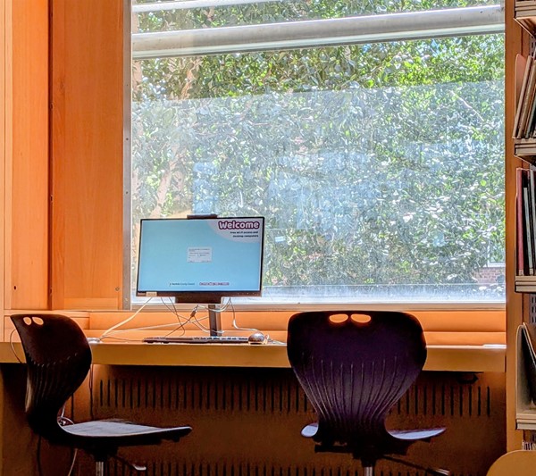 Image of desk with computer