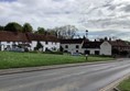 The Queen & Castle stands at the end of the row on Castle Green