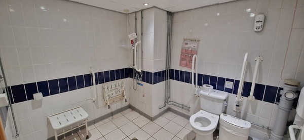 Large accessible toilet, throught the doors to pool on ground floor.