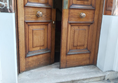 Close up of entrance door with 2 steps and no handrails, ramp is available