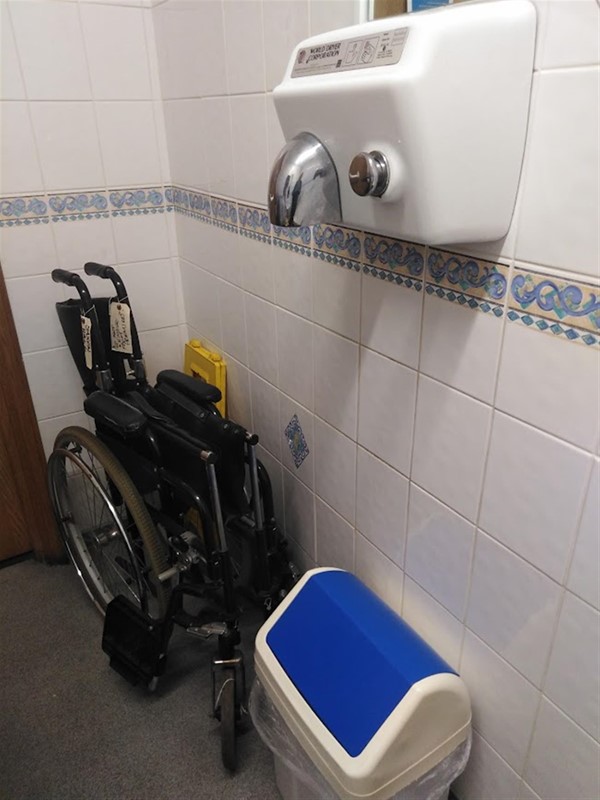 The storage cupboard/toilet.
