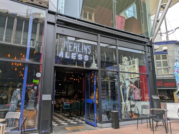 Image of entrance to Merlins