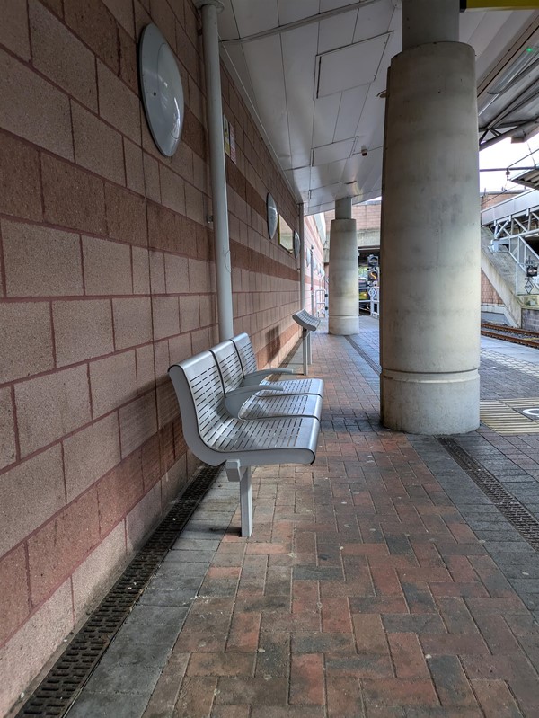 Image of metal seating on station platforms