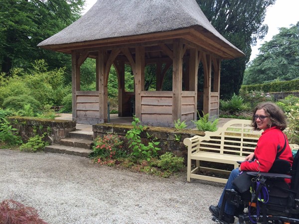 Zoe wheeling around the gardens at Dumfries House