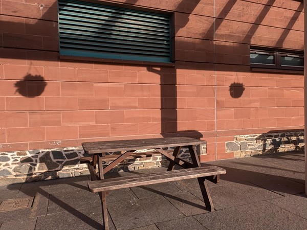 image of seating area outside the station