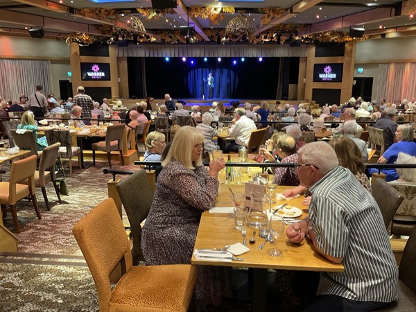 Image of people in a dining area