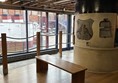 Image of a bench in front of a display
