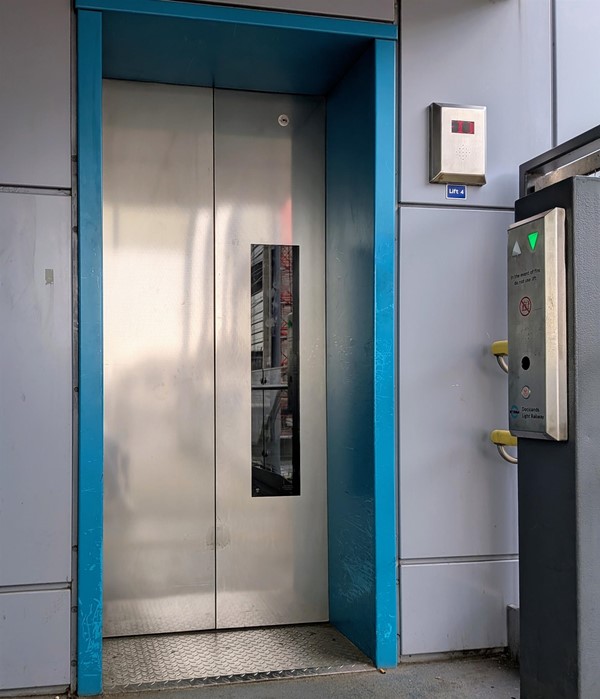 Image of lift between street level and overpass