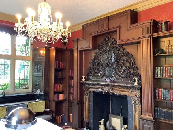 Picture of a room with a large fireplace