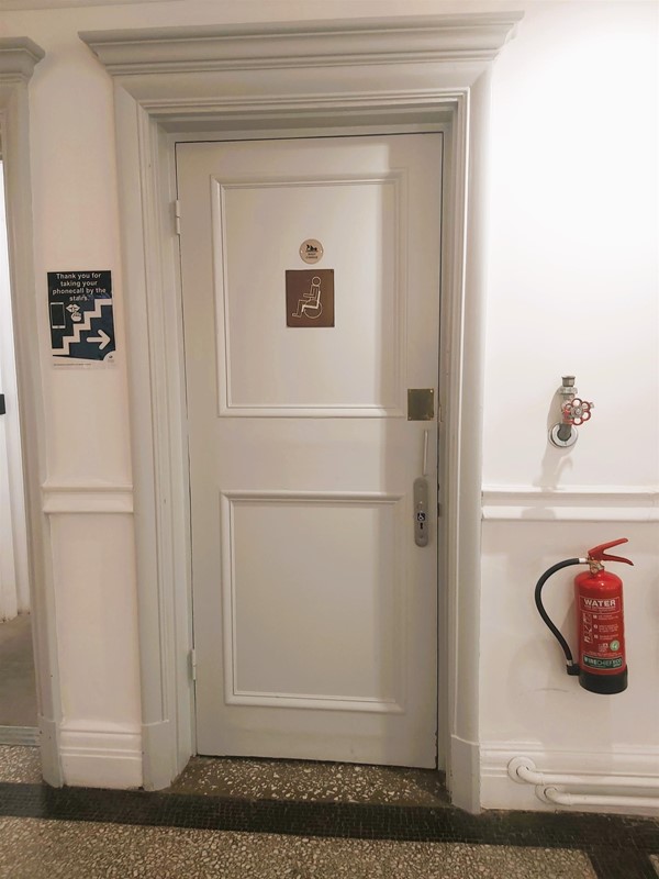 Image of an accessible toilet door