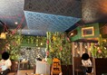 Picture of the counter and some tables in Gracie's