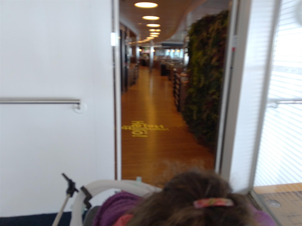 Image of a door leading to a blurry corridor