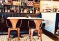 Easiest tables for wheelchair access.
