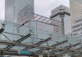 Image of station with view of HSBC tower and other Canary Wharf buildings behind it