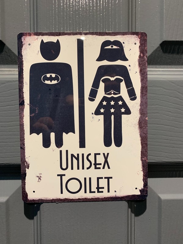 I love the toilet sign. Everyone is a super hero.