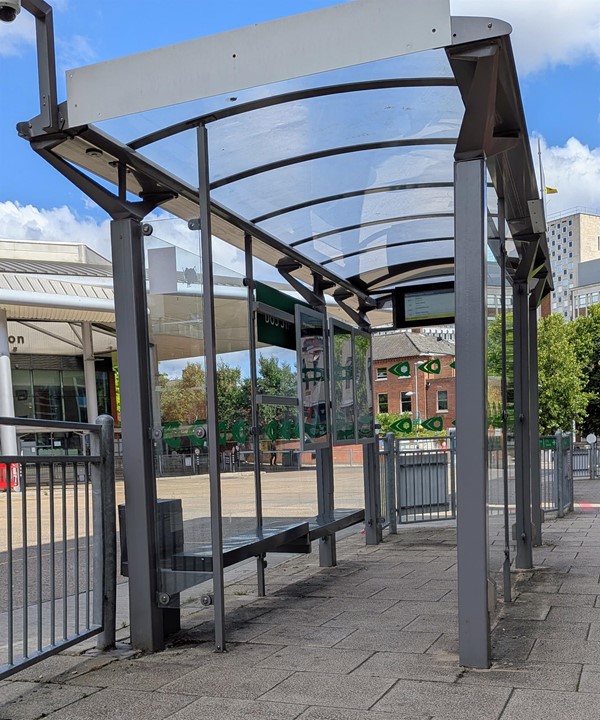 Image of covered bus shelter with seating