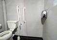 Image of accessible toilet left-side transfer space