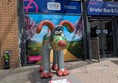 Image of a Wizard of Oz themed Gromit statue outside the station